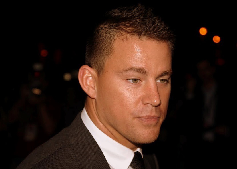Close-up of Channing Tatum's face against a dark background