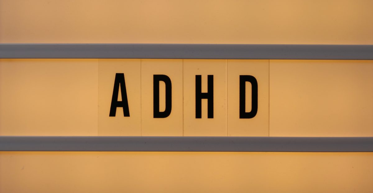 Close-up of a letter lightbox that has ADHD on it.