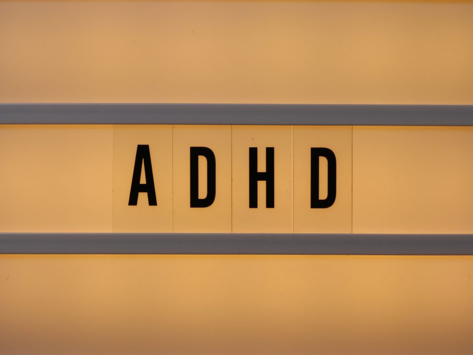 Close-up of a letter lightbox that has ADHD on it.