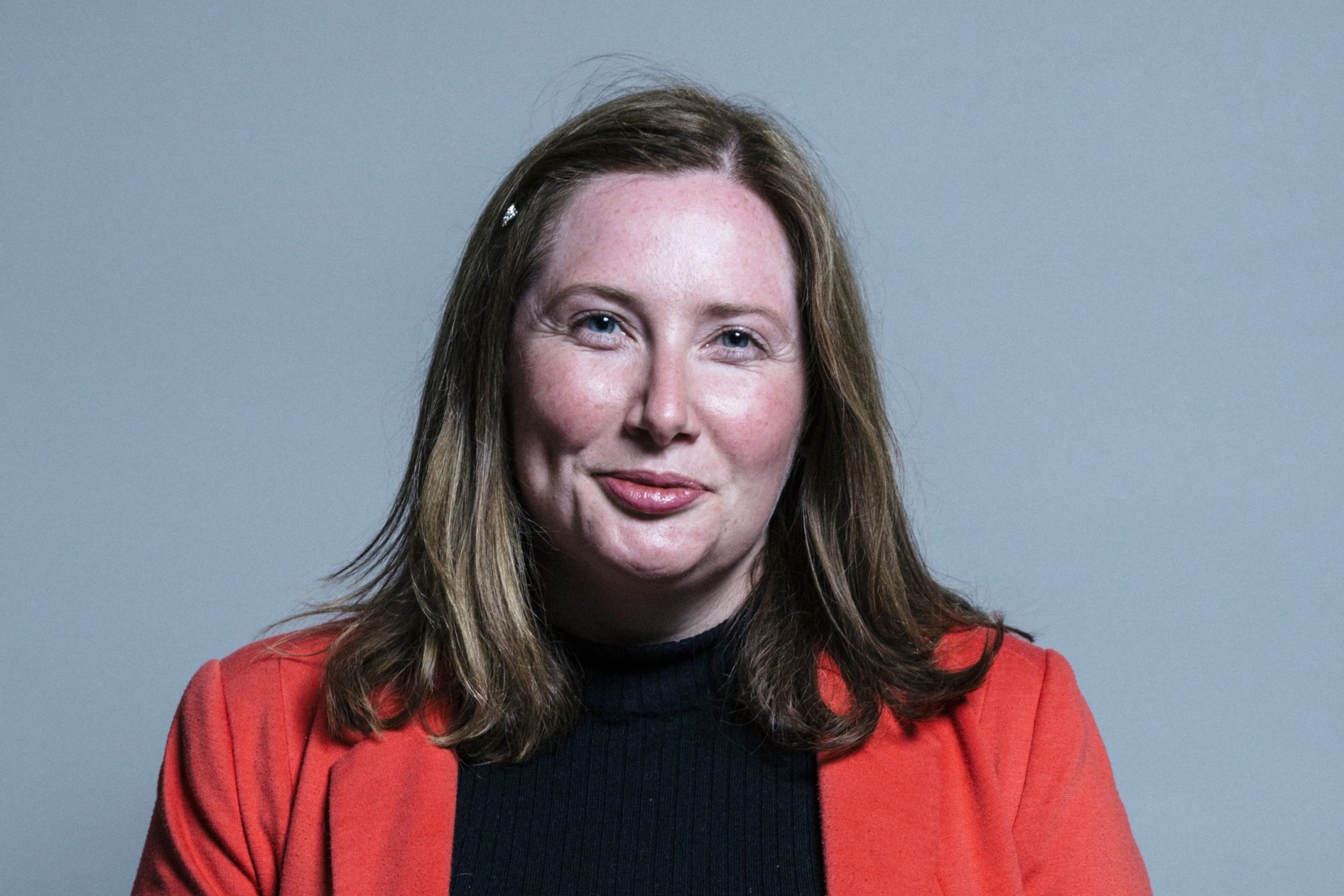 Emma Lewell-Buck, the Labour MP of South Shields, is posing in front of a grey background.