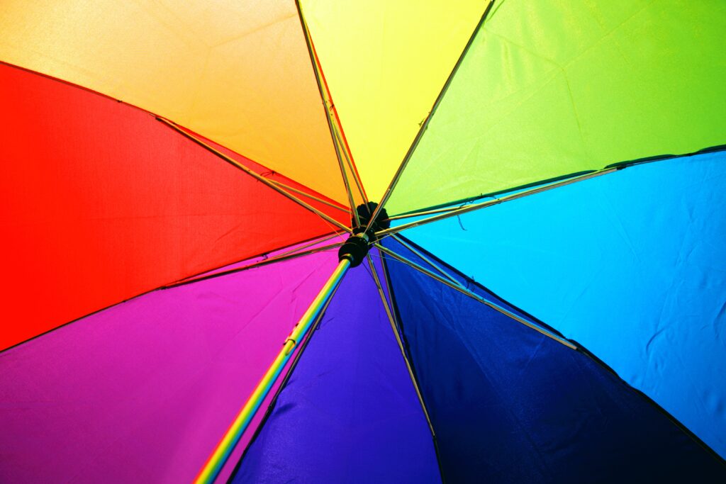 The inside of a multicoloured umbrella