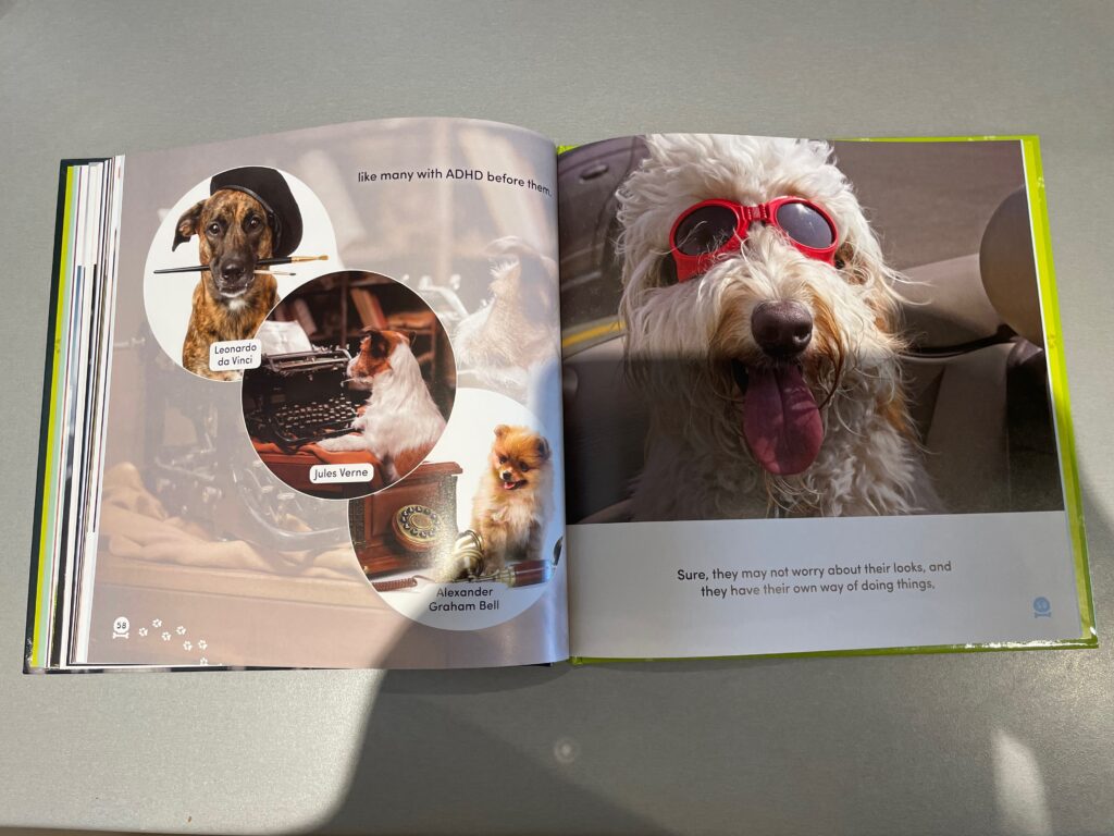 Two pages of All Dogs Have ADHD are open. The first shows a dog wearing a beret and holding paintbrushes in its mouth. The second dog is using a typewriter. The third dog is sitting beside an old-fashioned telephone. The text reads: "like many with ADHD before them," and, "Leonardo da Vinci, Jules Verne and Alexander Graham Bell. The second page shows a dog wearing sunglasses and panting. The text reads: "Sure, they may not worry about their looks, and they have their own way of doing things."