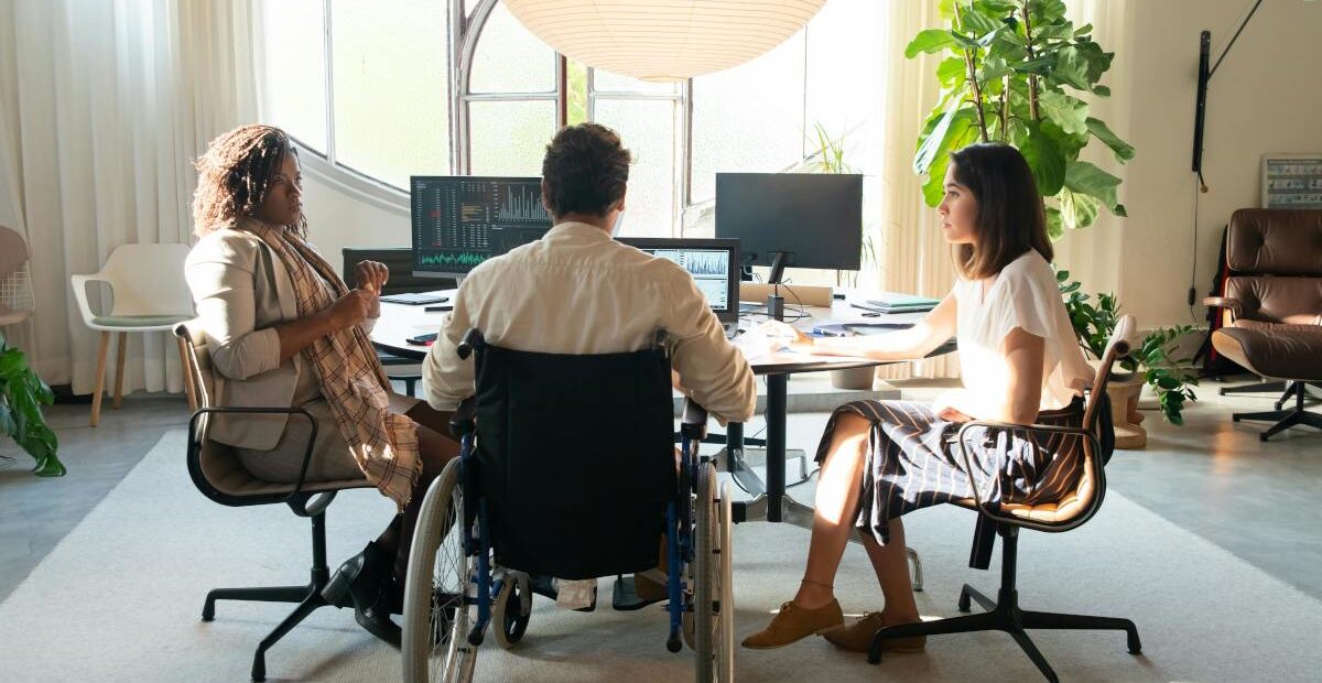 Diverse team collaborating in a modern office setting