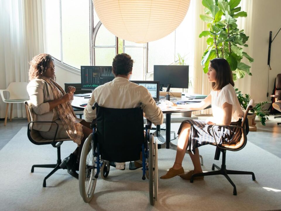 Diverse team collaborating in a modern office setting